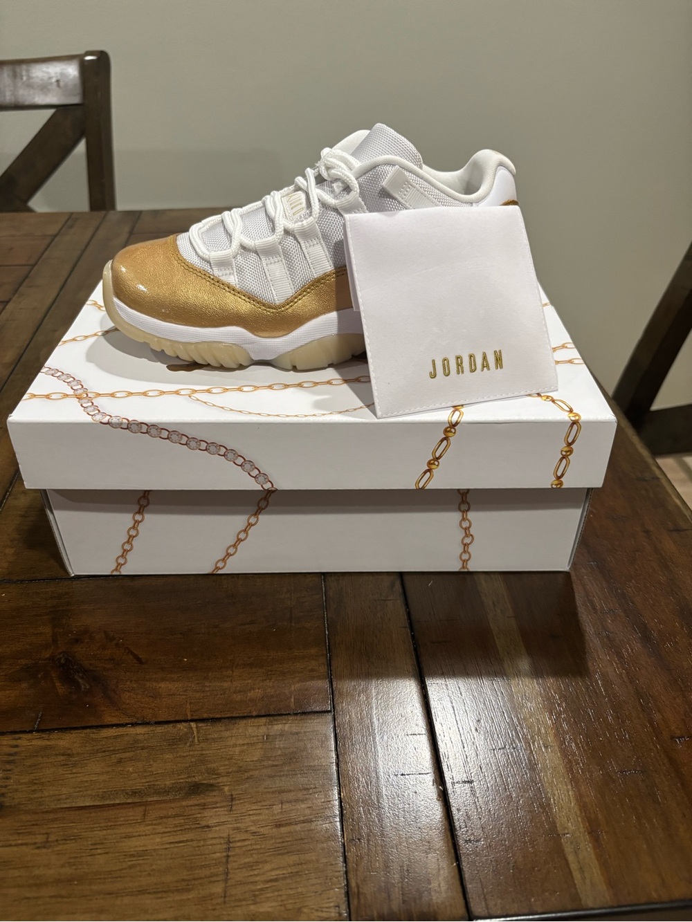Women’s Jordan White and Metallic Gold Low-Top Sneaker